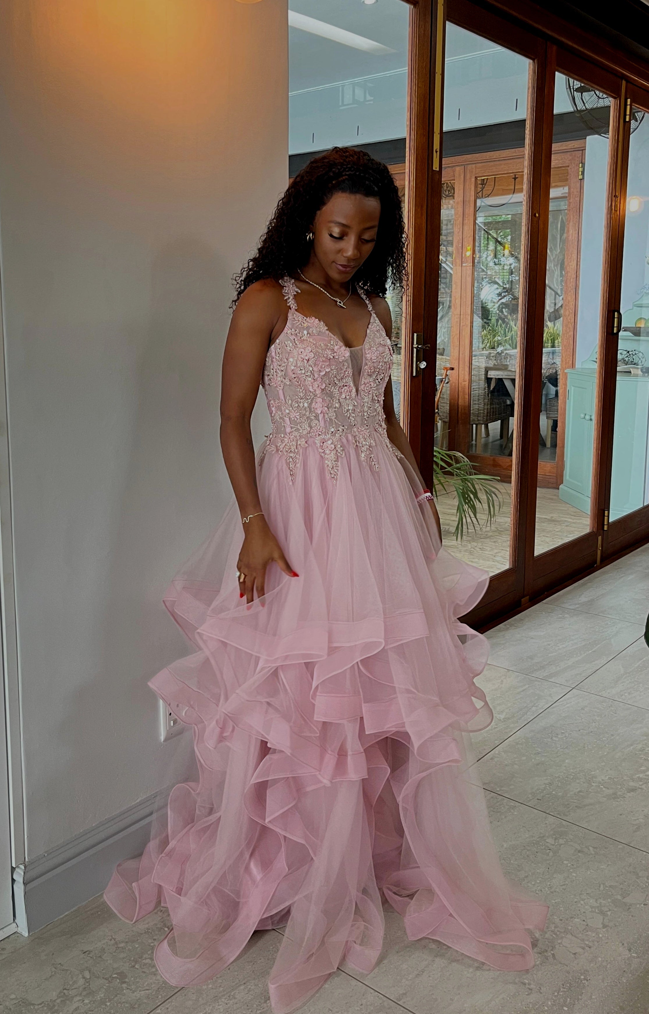 Soft pink layered dress with floral beaded top and lace up back.