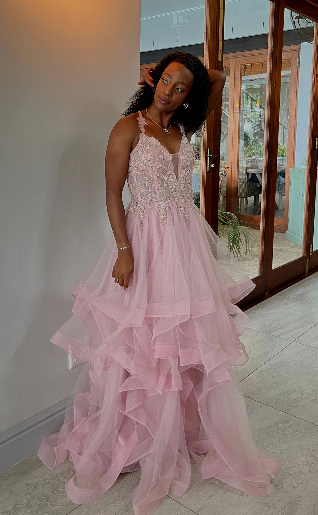 Soft pink layered dress with floral beaded top and lace up back.