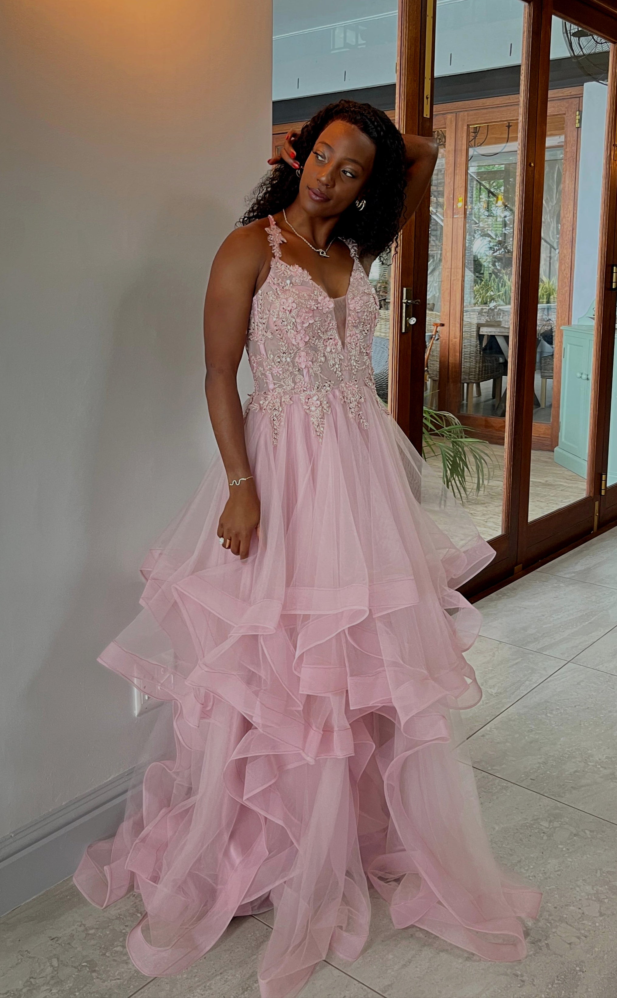 Soft pink layered dress with floral beaded top and lace up back.